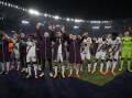 Bayer Leverkusen applaud their fans after silencing Roma with a 2-0 win at Rome's Olympic Stadium. (AP PHOTO)