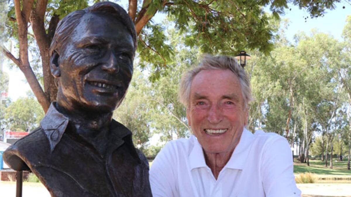 Frank Ifield with his bronze bust in Tamworth's Bicentennial Park. Picture Frank Ifield