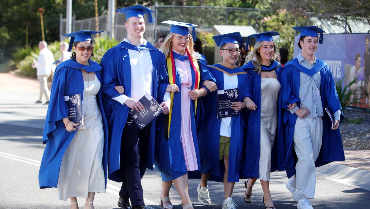 A group of University of Wollongong students at the spring graduation ceremony on October 31. Picture by Sylvia Liber