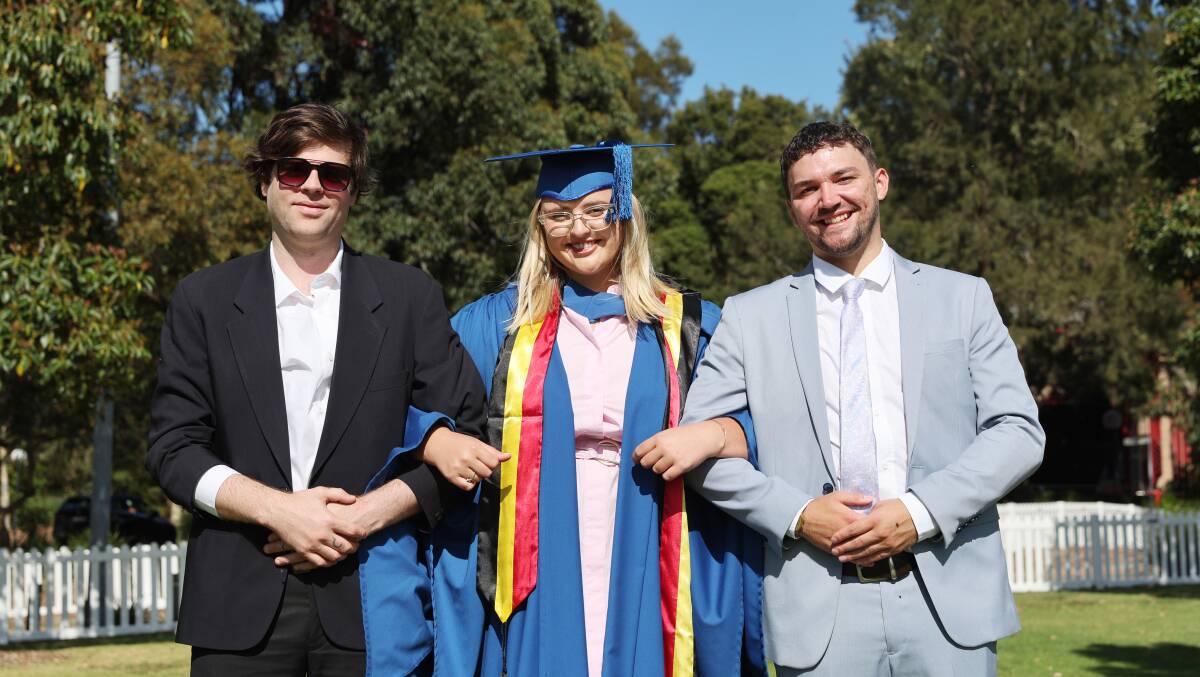 Harrison Frost, Gabrielle Frost and Tommy Foss at the UOW spring graduations at UOW Sports Hub on October 31, 2023. Picture by Sylvia Liber.