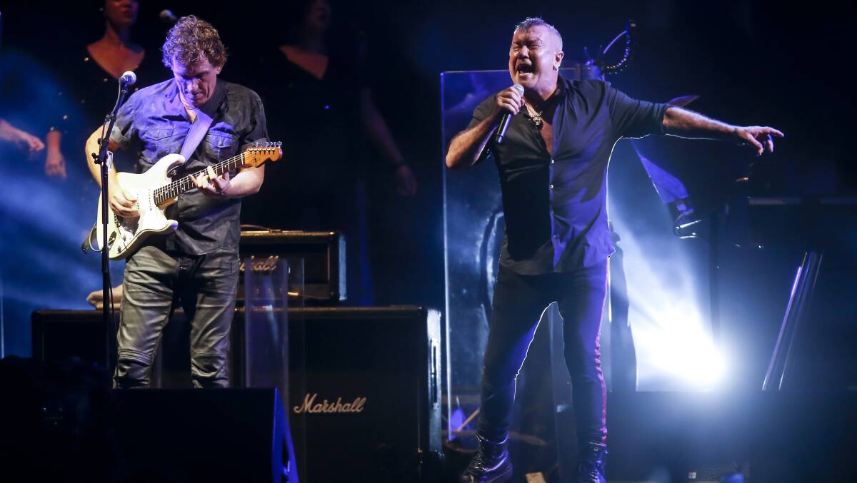 Cold Chisel's Jimmy Barnes belts it out next to Ian Moss in Wollongong back in 2020. Picture by Anna Warr. 