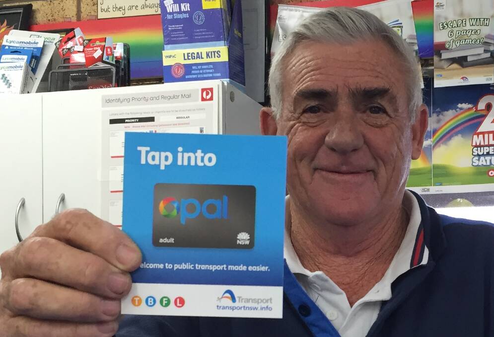 CONVENIENCE ONLY: It's good PR and helpful. Garry Ware displays the Opal Card travelers can now buy at Burrill Lake. He says the financial reward to agents is only one per cent of sales.