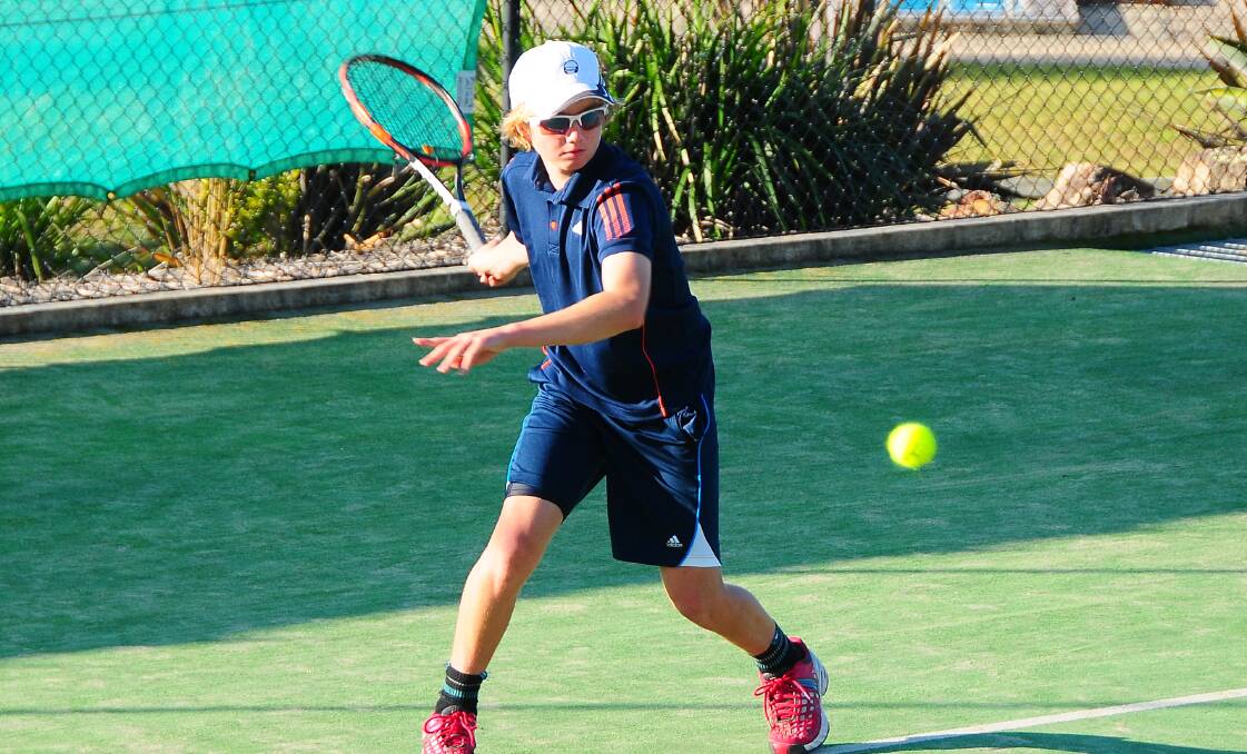 FOCUS: Local player Anton Willett goes in for the hit at the 2015 Bronze Junior Tournament. Photo: Lisa Hardwick.