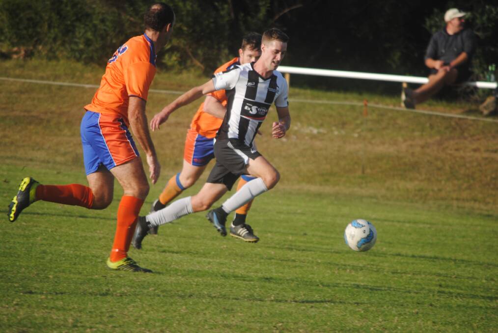 Milton's Jarrod Murray goes on the attack against Culburra.